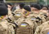 Battlefield Internet Yo-Yo After Trump Nudge Soldiers in camouflage uniforms with berets and backpacks