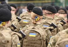 Battlefield Internet Yo-Yo After Trump Nudge Soldiers in camouflage uniforms with berets and backpacks