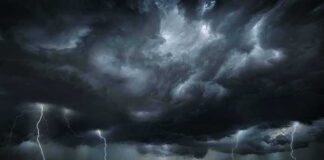 Dark storm clouds with multiple lightning bolts