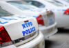 Row of NYPD police cars parked in a line