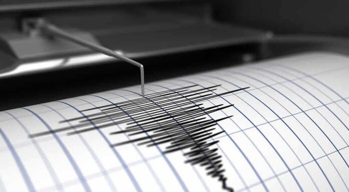 shutterstock_415252909 Seismograph needle recording earthquake waves on paper