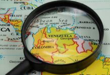 Magnifying glass over a map of northern South America